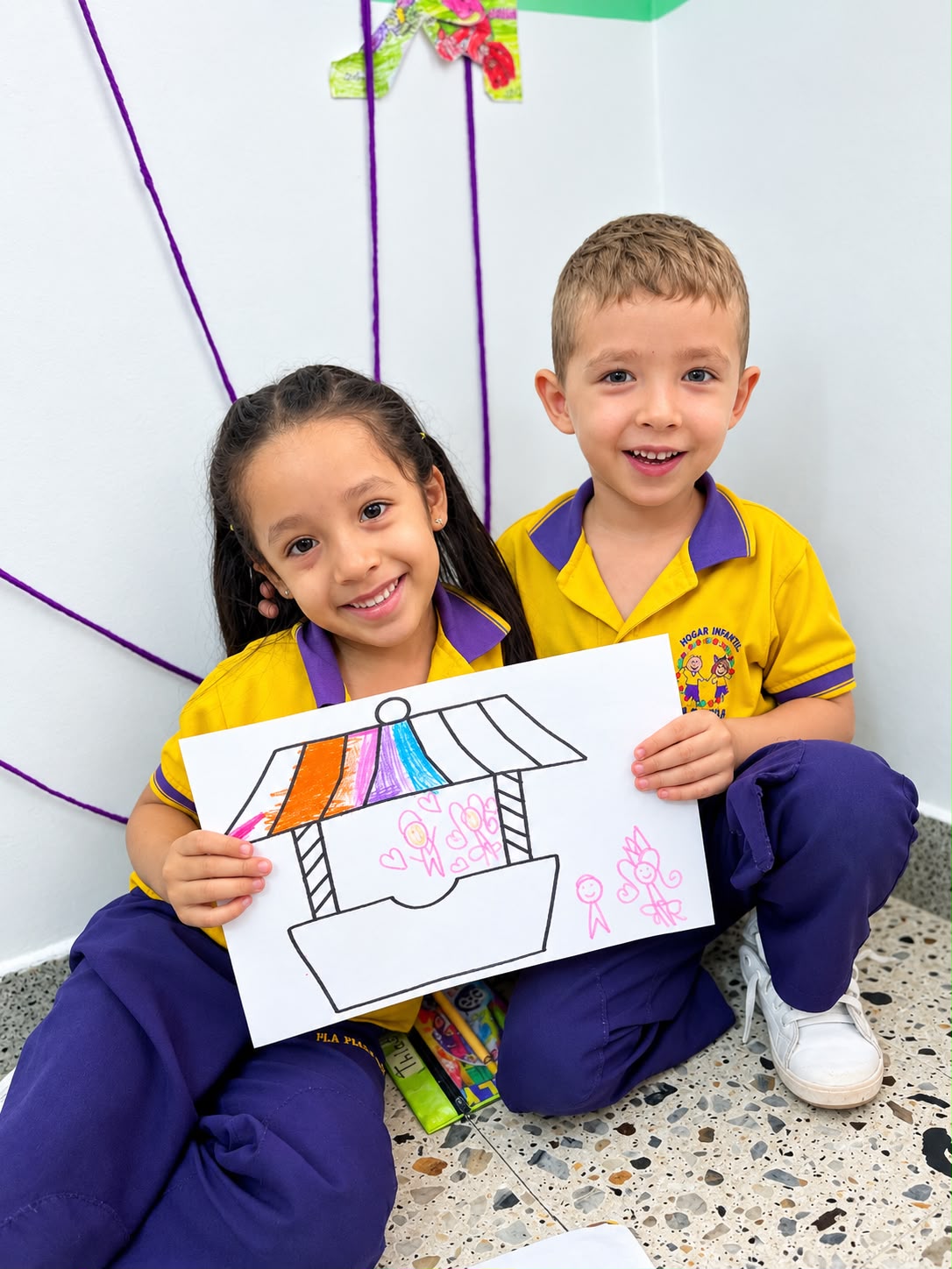 Niños jugando en el Hogar Infantil